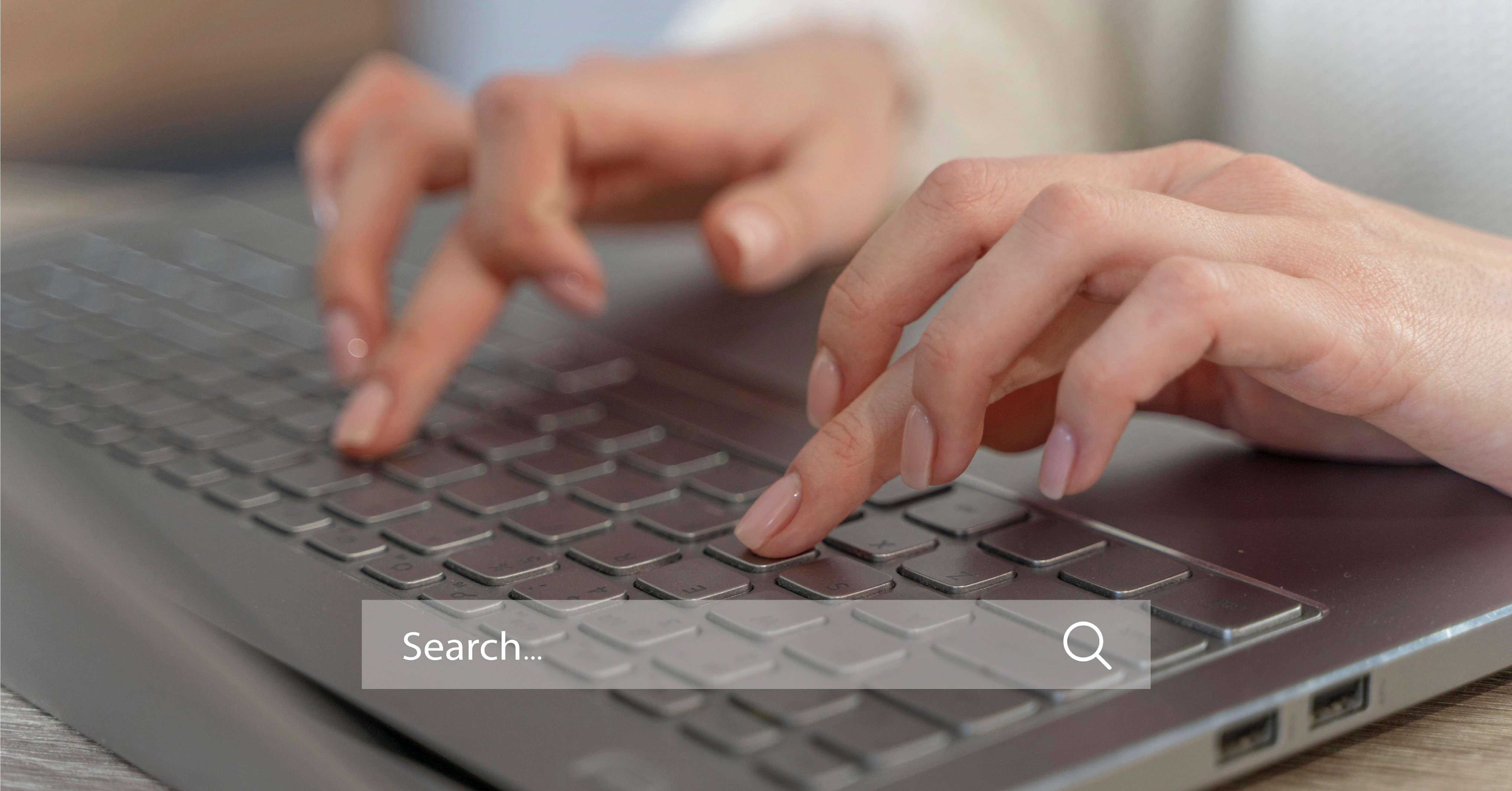someone-typing-on-a-keyword-to-improve-seo