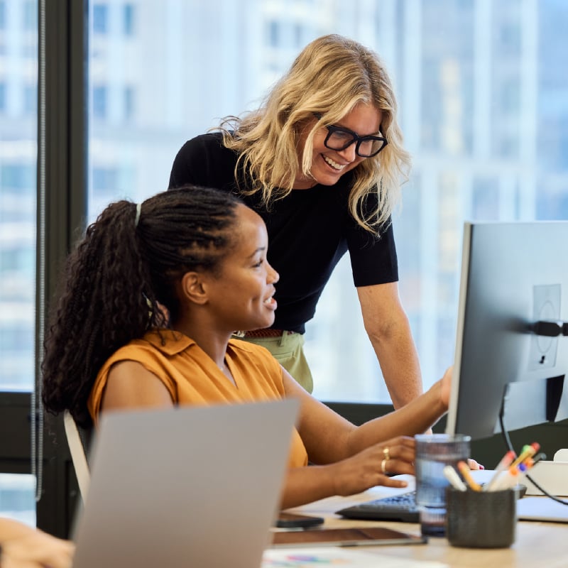 coworkers-looking-at-computer